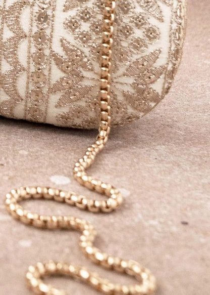 Mirai embroidery clutch cream