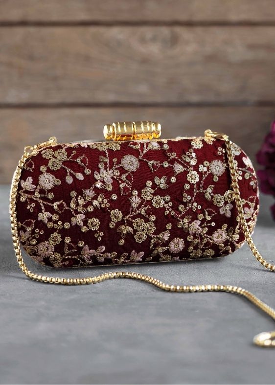 Elan maroon silk capsule clutch