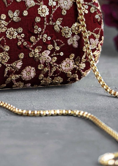 Elan maroon silk capsule clutch