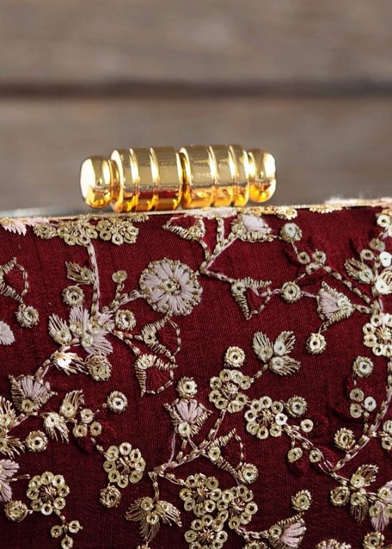 Elan maroon silk capsule clutch