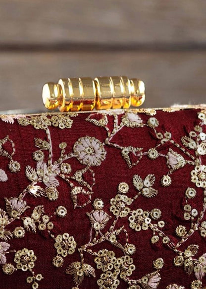 Elan maroon silk capsule clutch