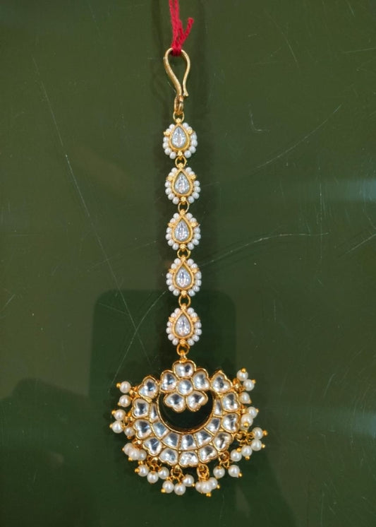 Flower with white pearls tikli