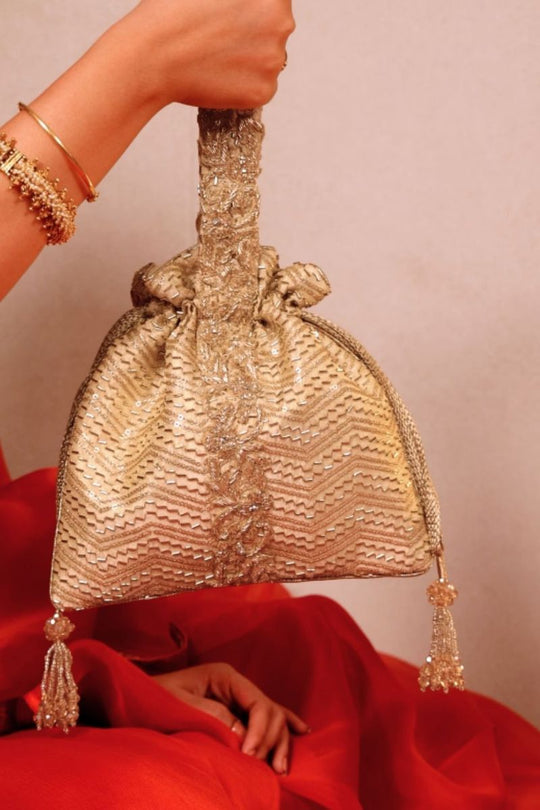 Sunehri Embroidered top handle potli - Gold
AM-PT-0526-0003