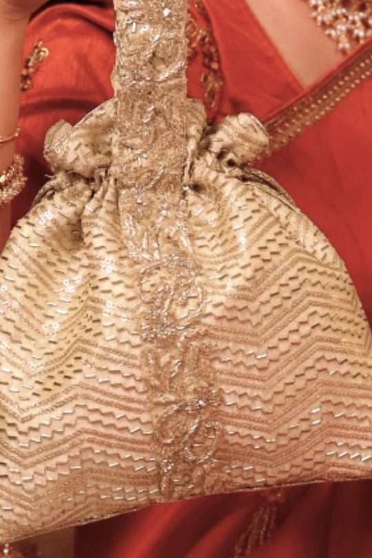 Sunehri Embroidered top handle potli - Gold
AM-PT-0526-0003