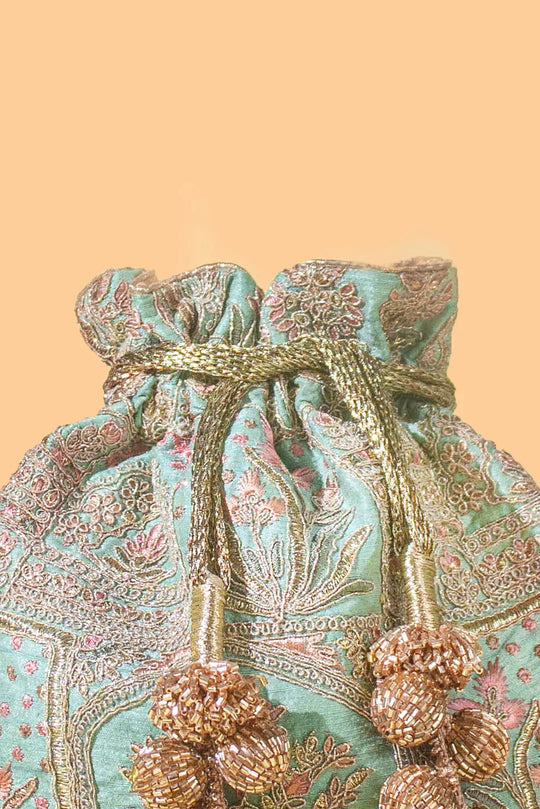 Amer turquoise potli
AM-PT-0723-0007