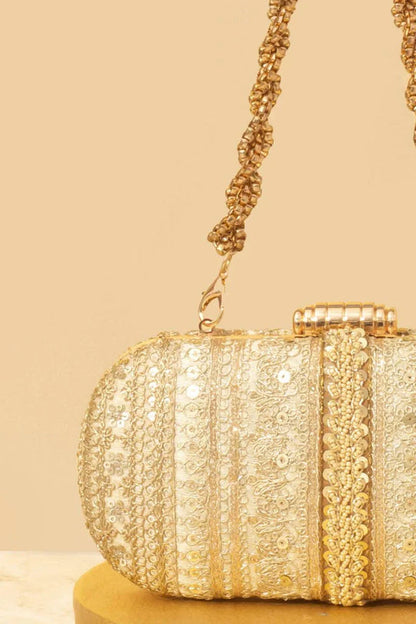 Naaz Embroidered Capsule Clutch - Gold
AM-BC-0924-0003