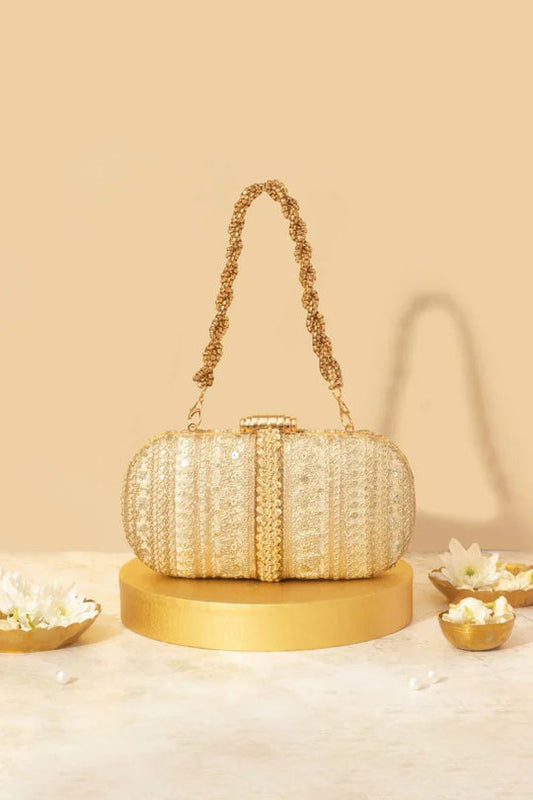 Naaz Embroidered Capsule Clutch - Gold
AM-BC-0924-0003